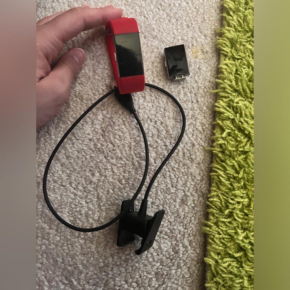 Fitbit Charge 2 with extra watch face & charger and one red band